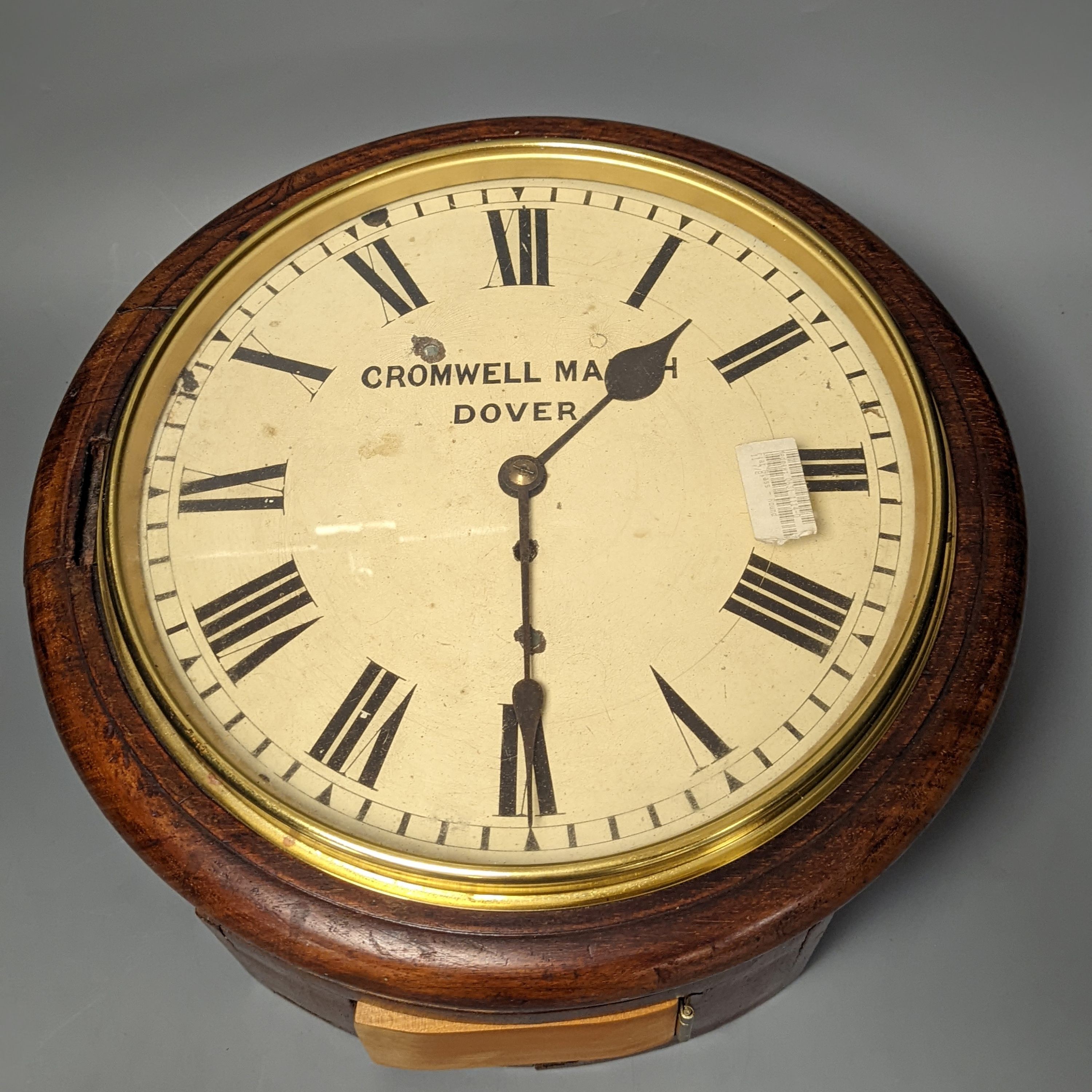 A Victorian mahogany dial timepiece, 37 cms diameter.